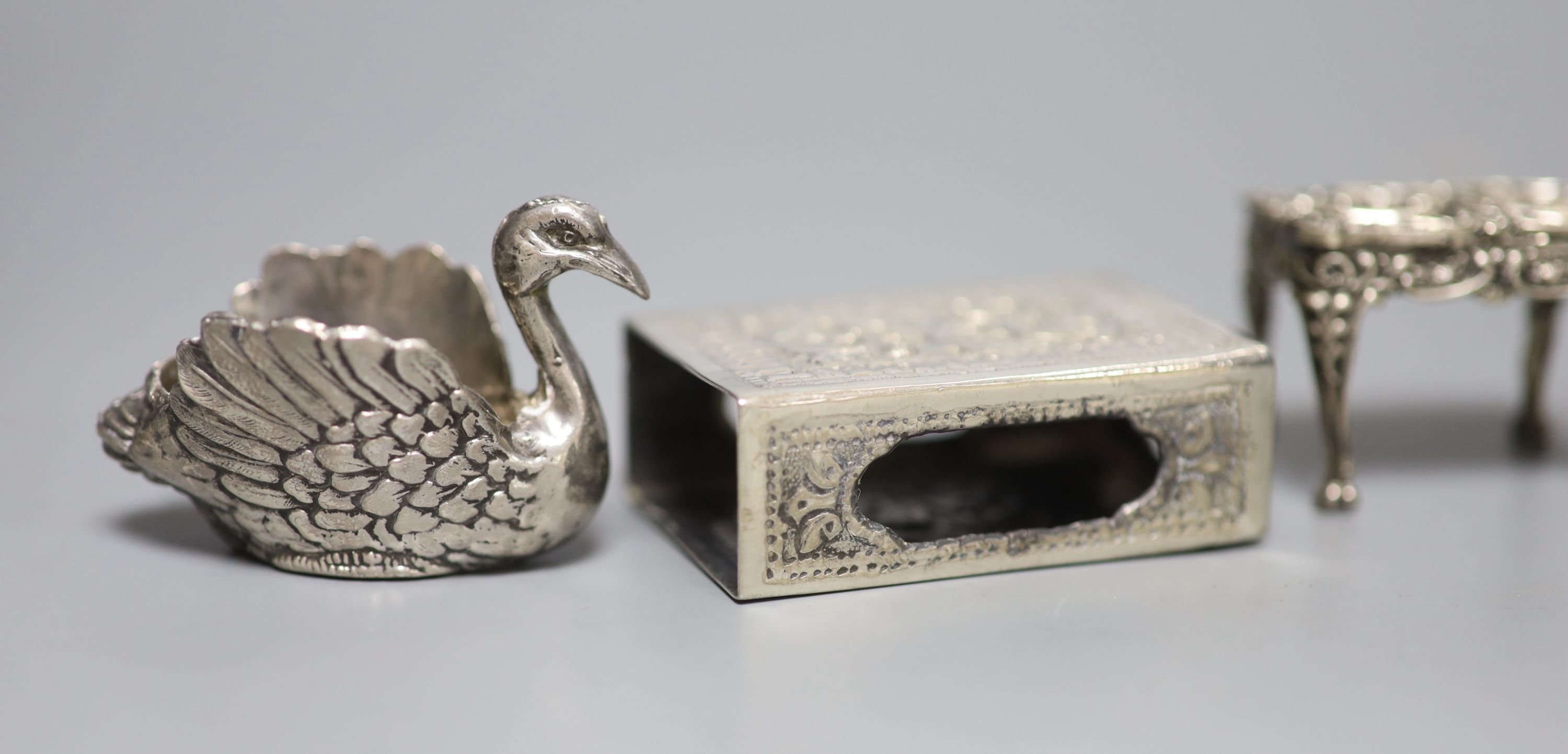 An Edwardian miniature silver model of a settee, two later chairs and a table and five other items, including aide memoire.